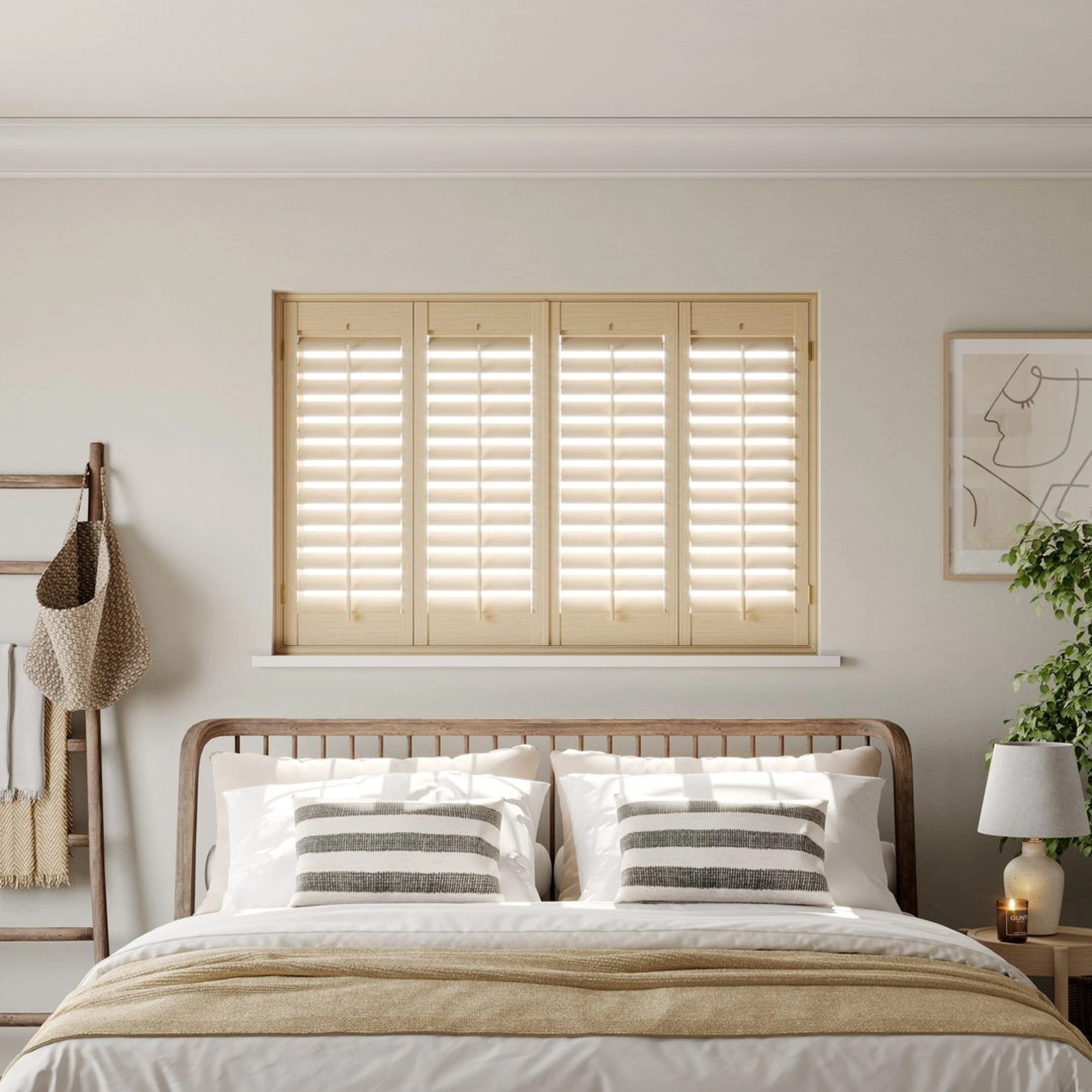 A modern neutral bedroom with Natural Stained full height wooden shutters