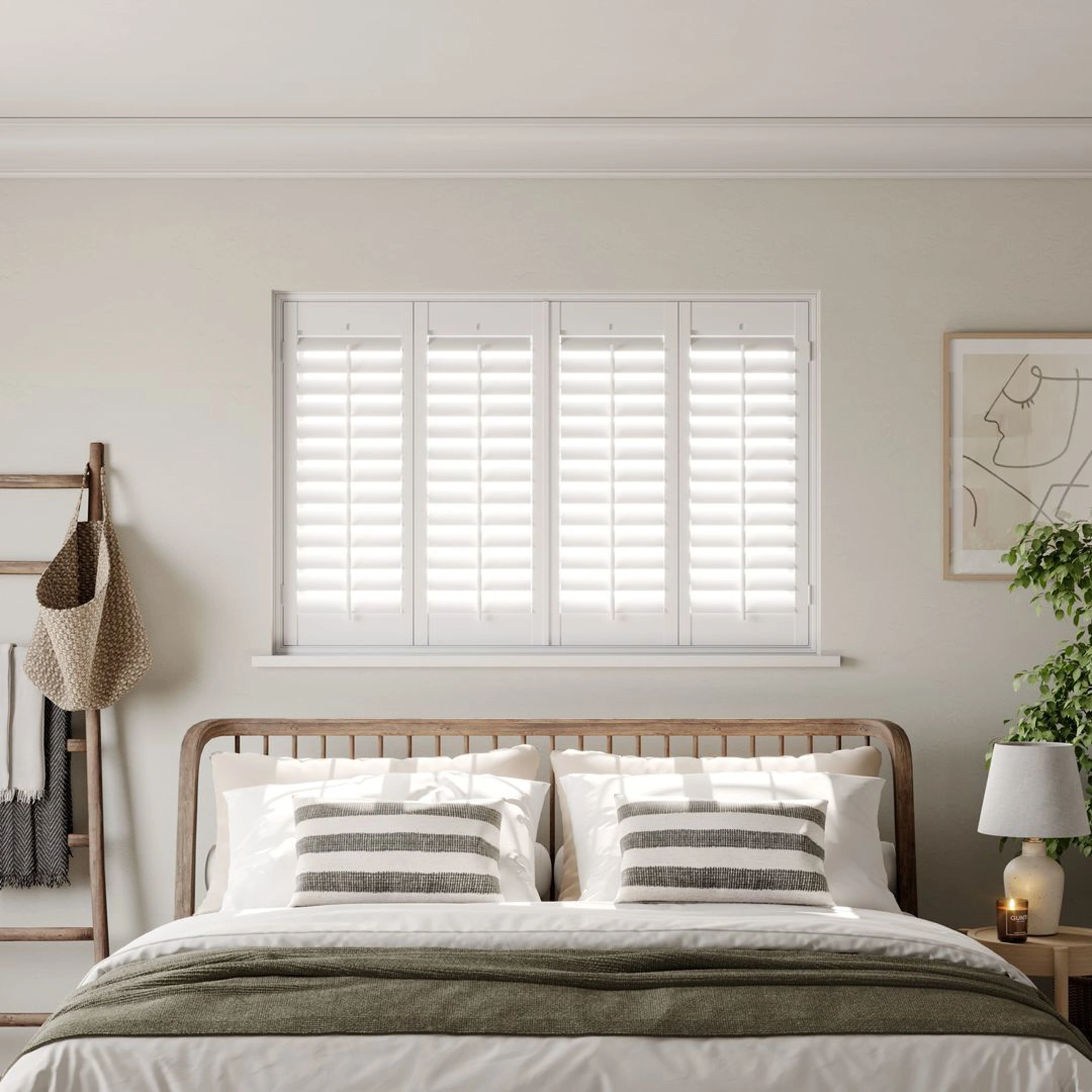 A modern neutral bedroom with Vivid White full height wooden shutters