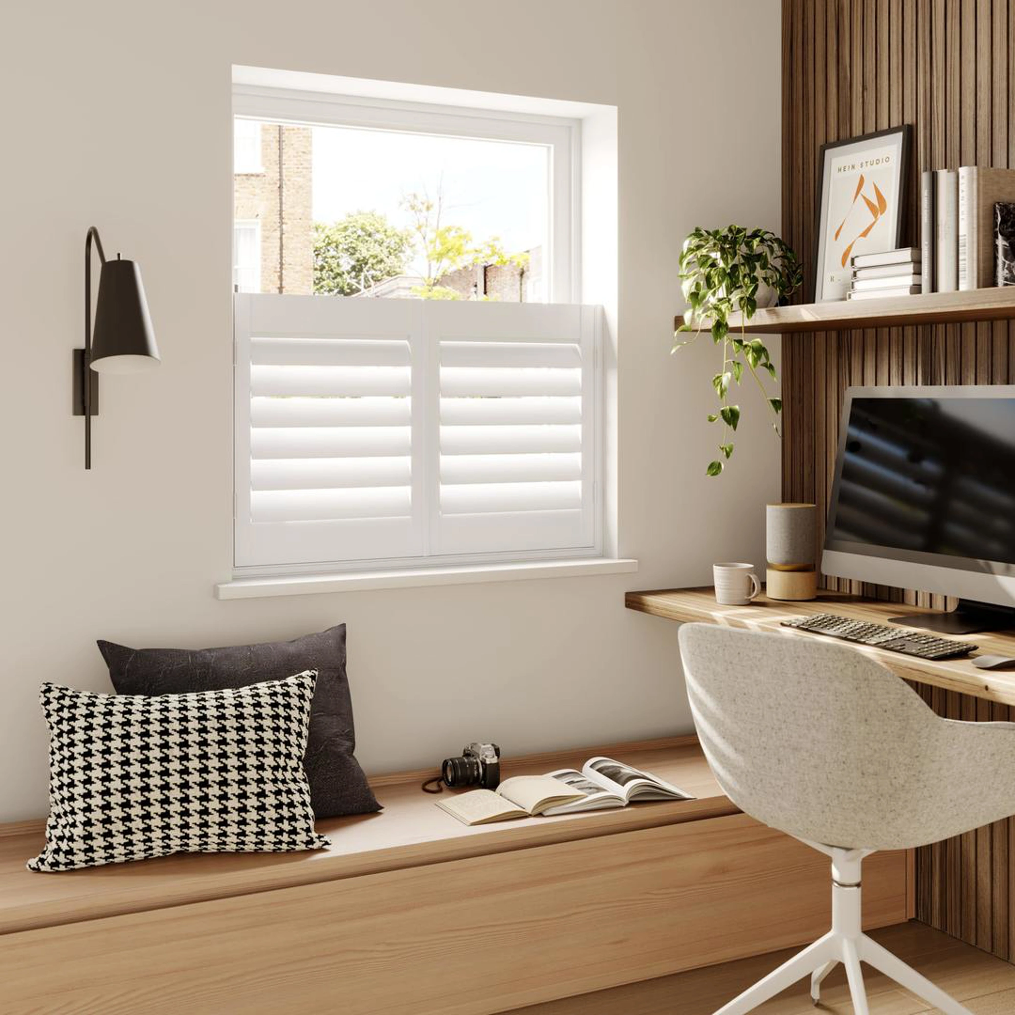 A modern home office with Vivid White cafe style wooden shutters 