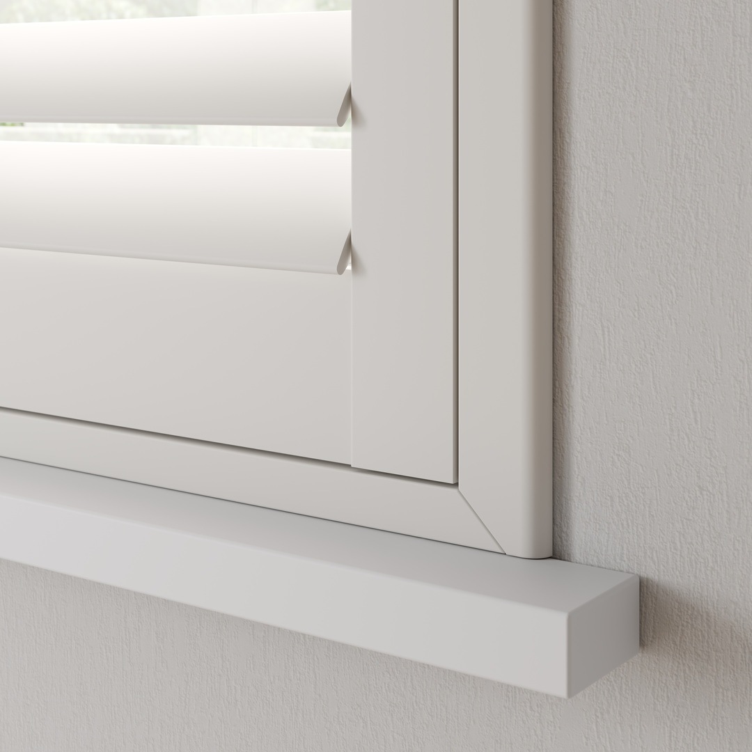 Outside view of a Silk White faux wood shutter with a Z Frame