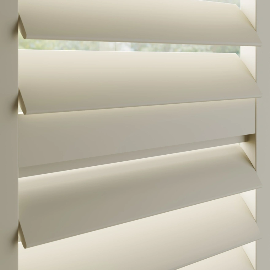 Cream wooden shutter with a midrail and hidden tilt rod