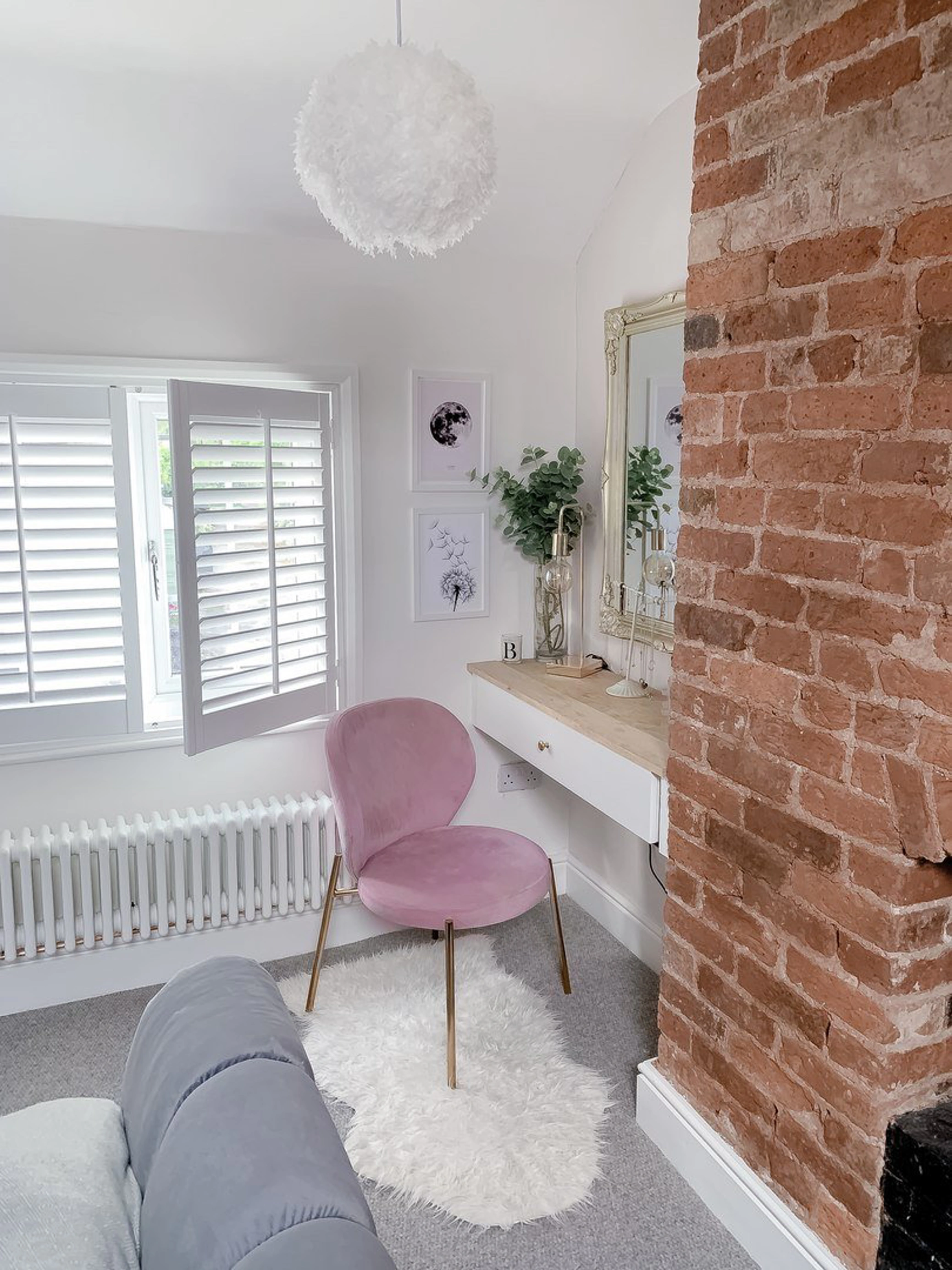 Vivid White wooden shutters in pink and white dressing room