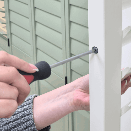 How to adjust shutter slat tension - use a screwdriver to adjust the tension