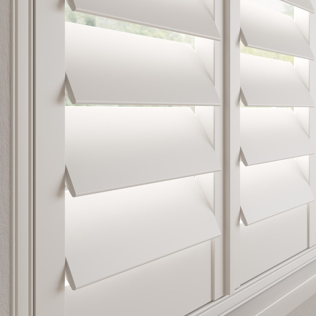 A Traffic White wooden shutter with 89mm slats and a hidden tilt rod