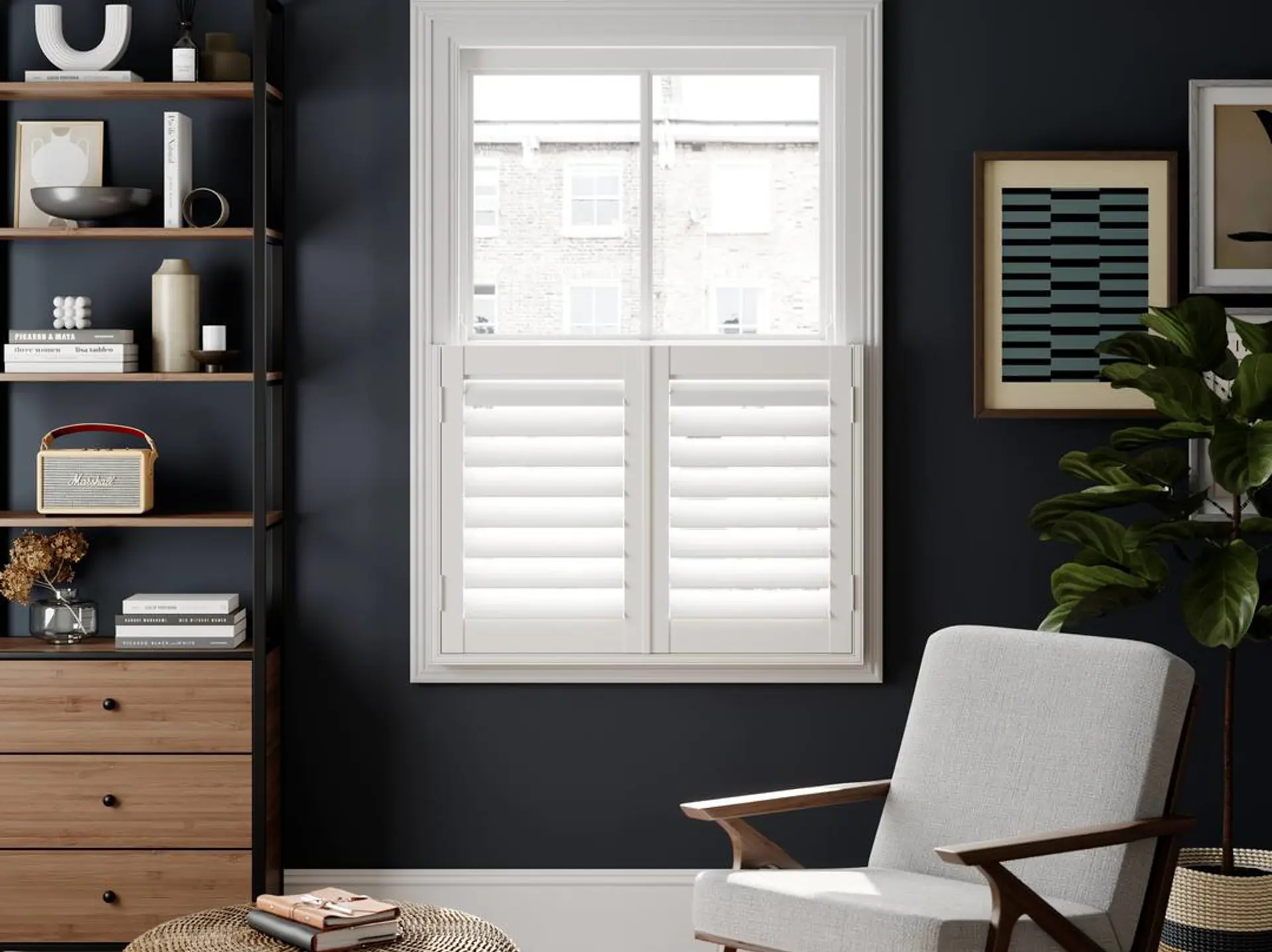 A navy living room with Silk White cafe style faux wood shutters 