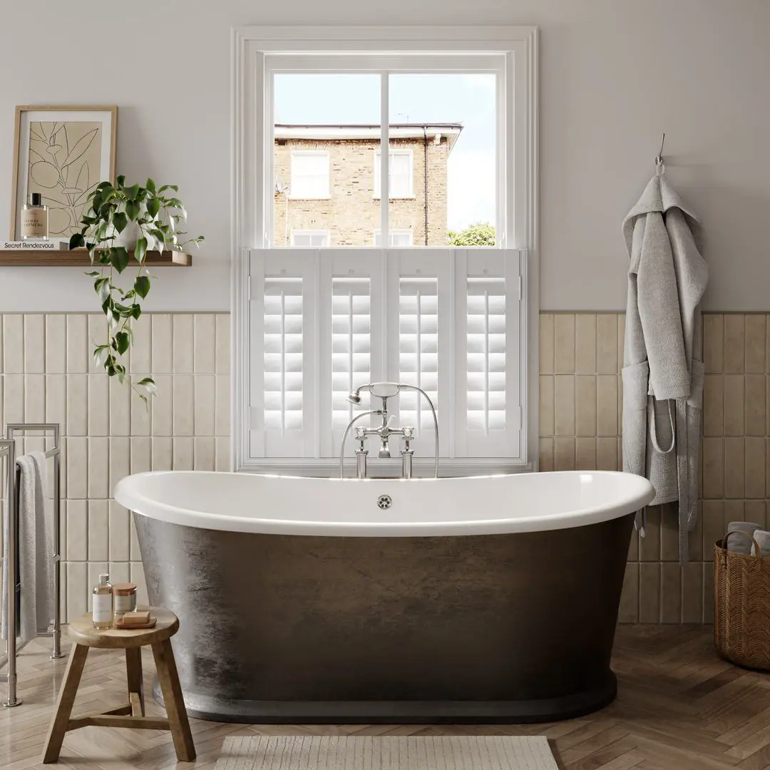 Vivid White cafe style faux wood shutters in traditional bathroom