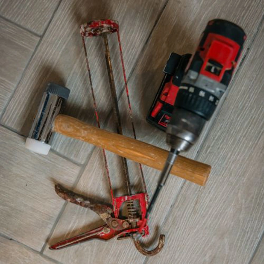 Drill Hammer And Caulk Gun