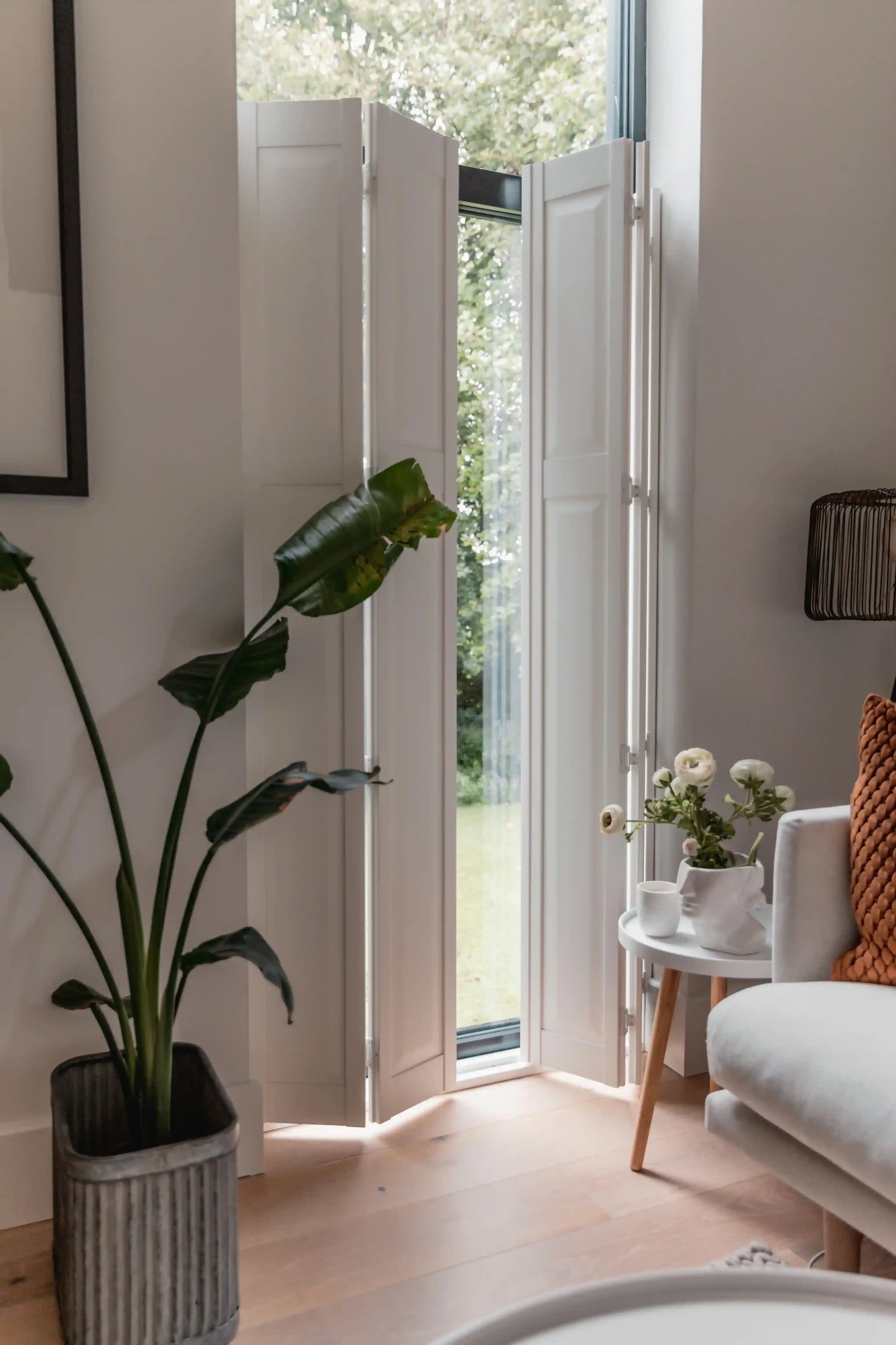 Solid panel shutters on bedroom doors