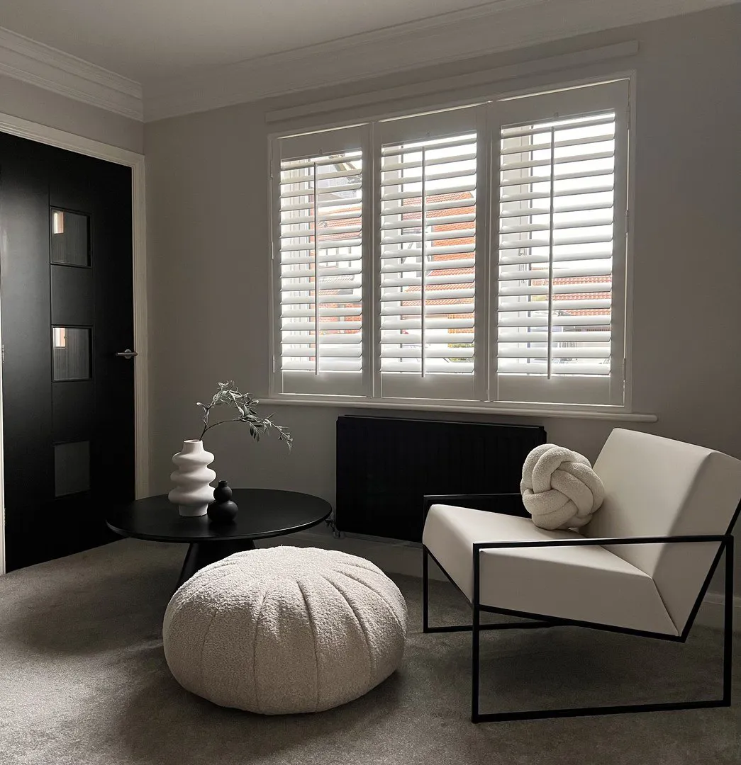 Vivid White faux wood shutters in black and cream modern living room