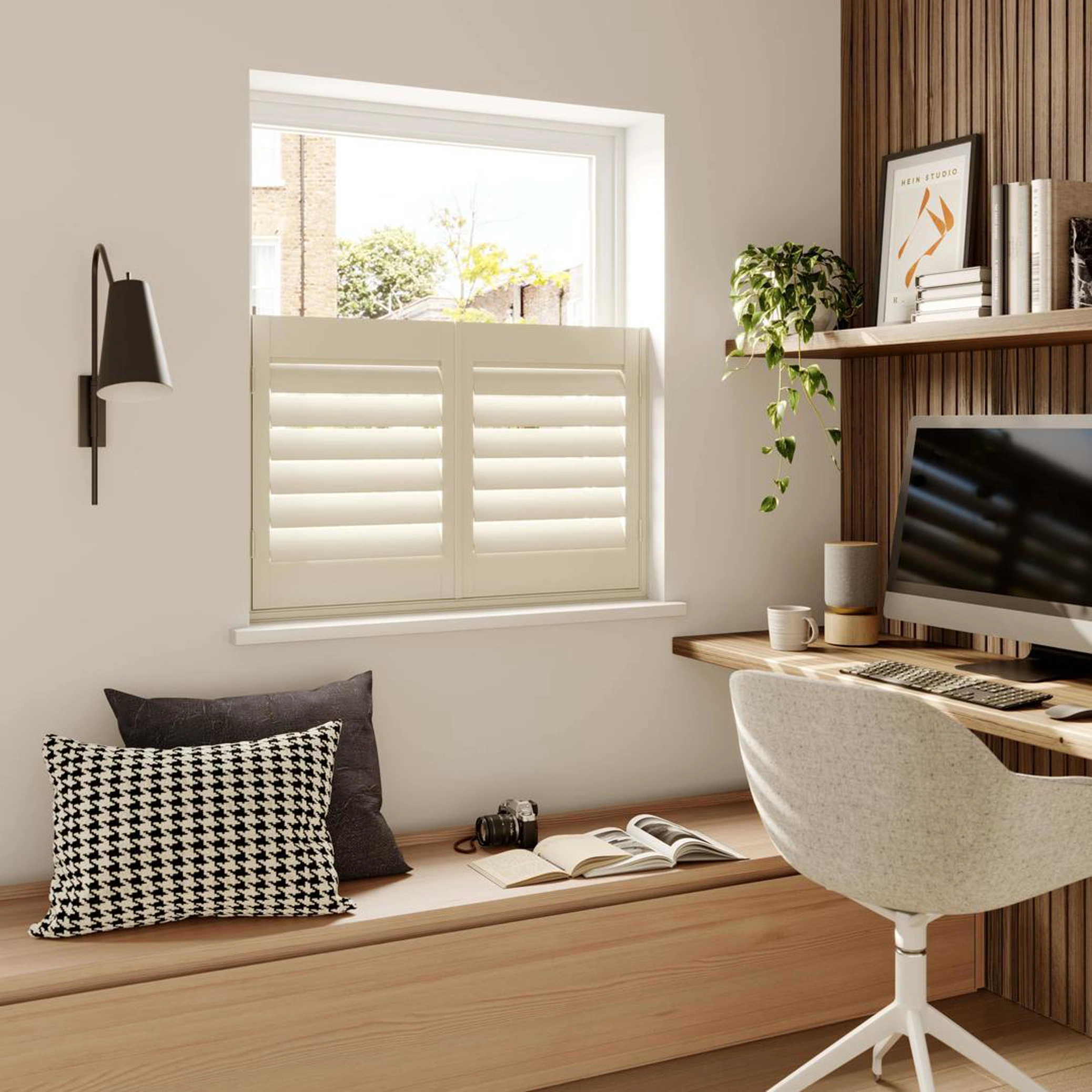 A modern home office with Cream cafe style wooden shutters 