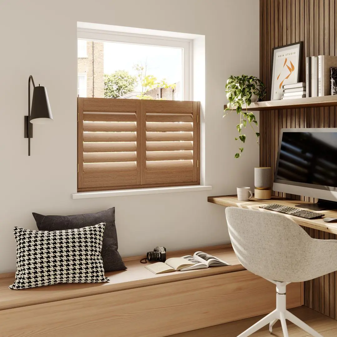 A modern home office with Honey Stained cafe style wooden shutters 