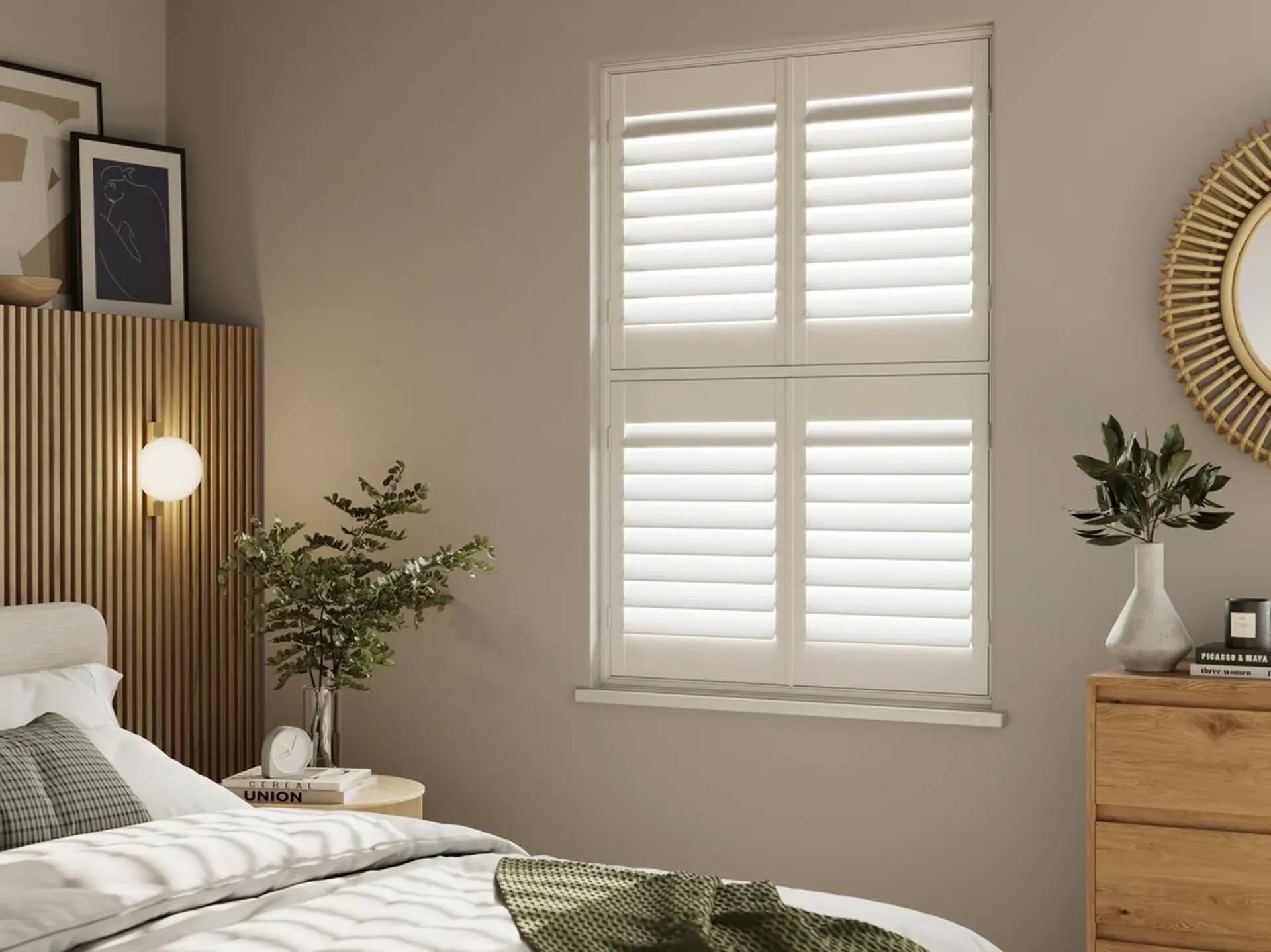 A neutral decorated bedroom with Traffic White tier on tier wooden shutters 