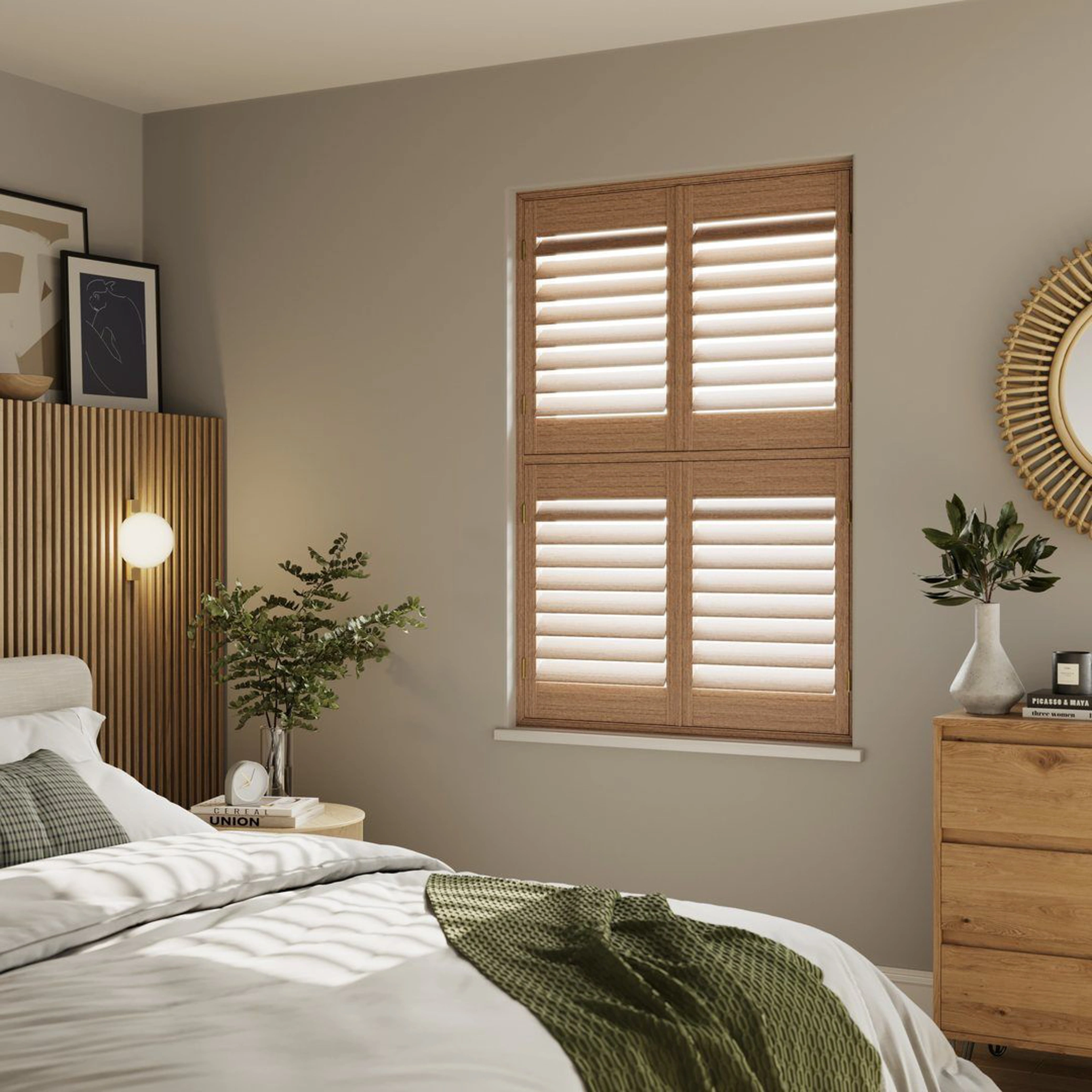 A neutral decorated bedroom with Honey Stained tier on tier wooden shutters 