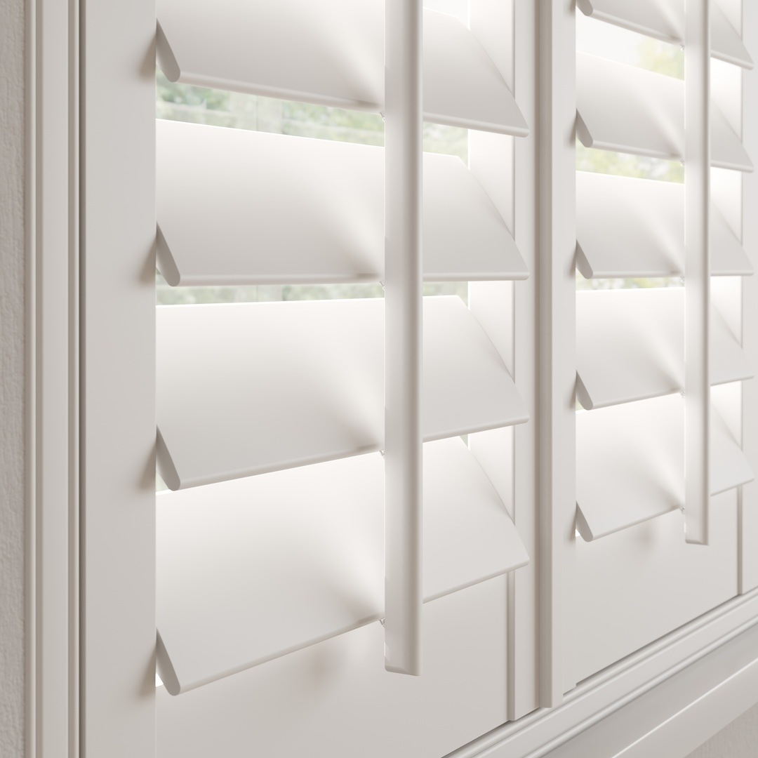 A Traffic White wooden shutter with 76mm slats and a central tilt rod 