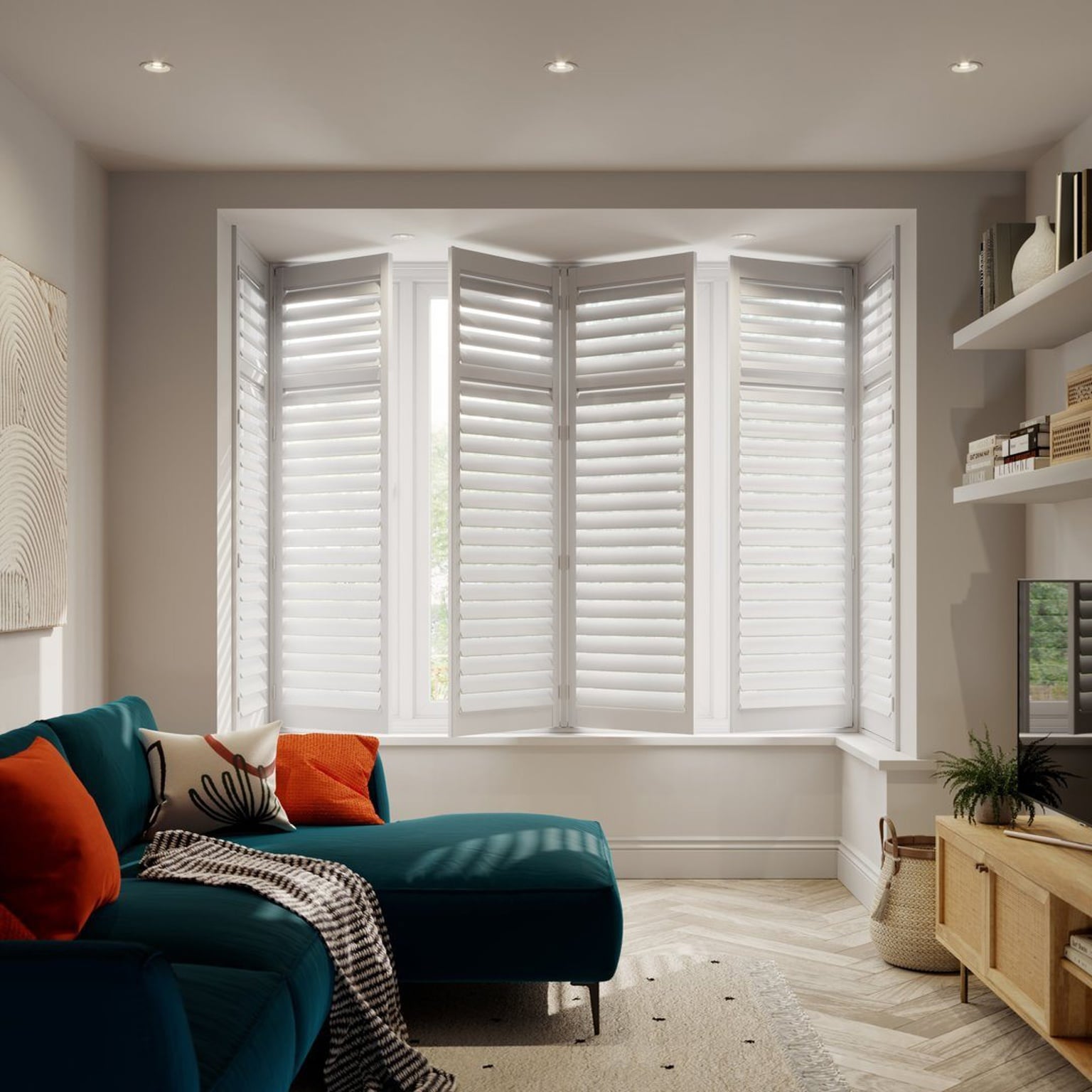 Vivid White wooden full height shutters in box bay living room window