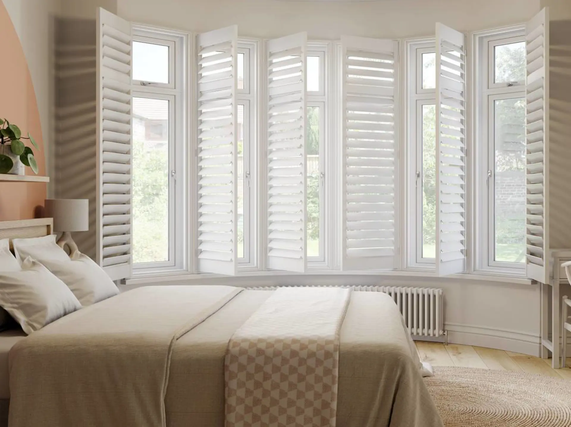 Vivid White full height shutters in curved bay neutral bedroom window