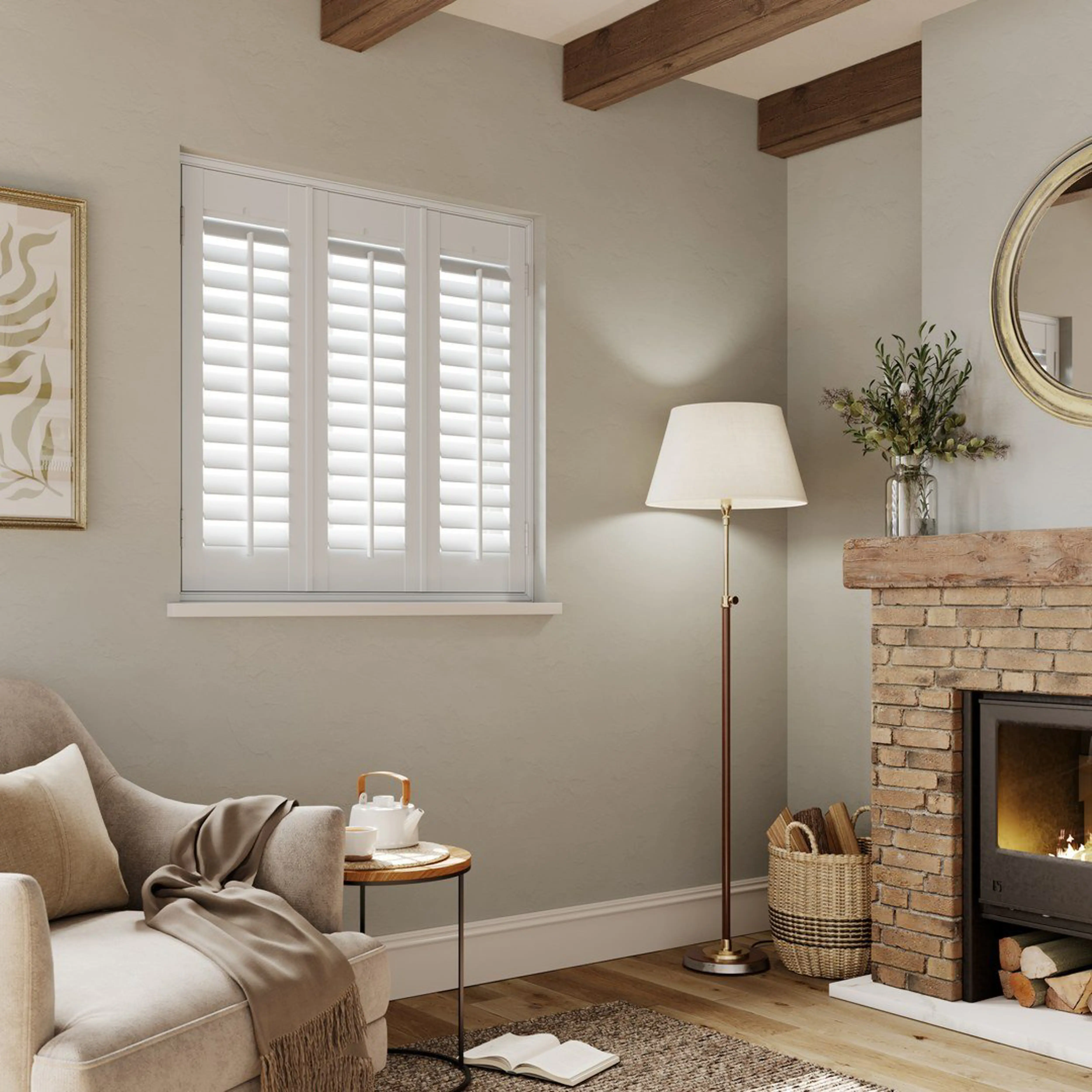 A cottage style living room with Snow White full height faux wood shutters 