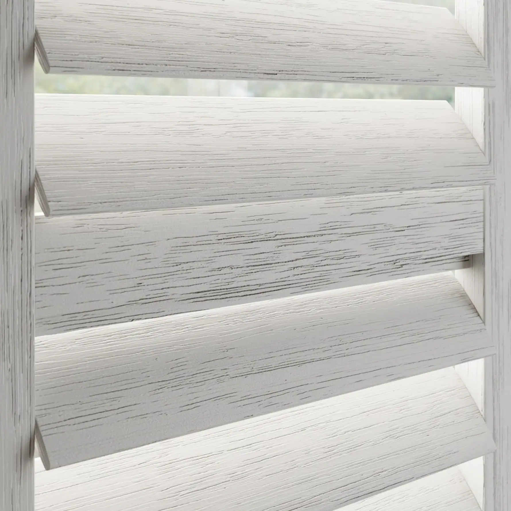 White Grained wooden shutter with a midrail and hidden tilt rod