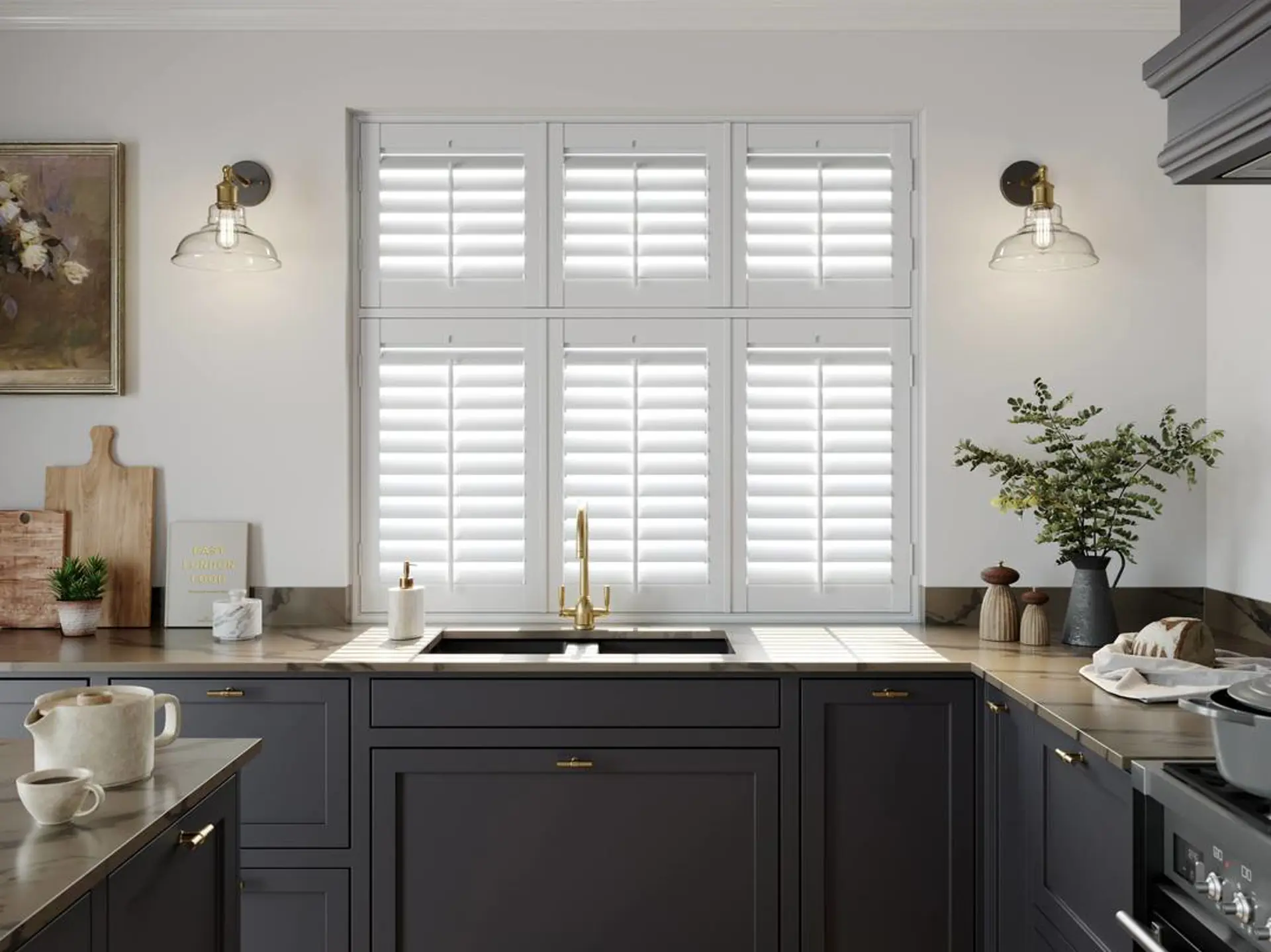 A traditional kitchen with Snow White tier on tier faux wood shutters 