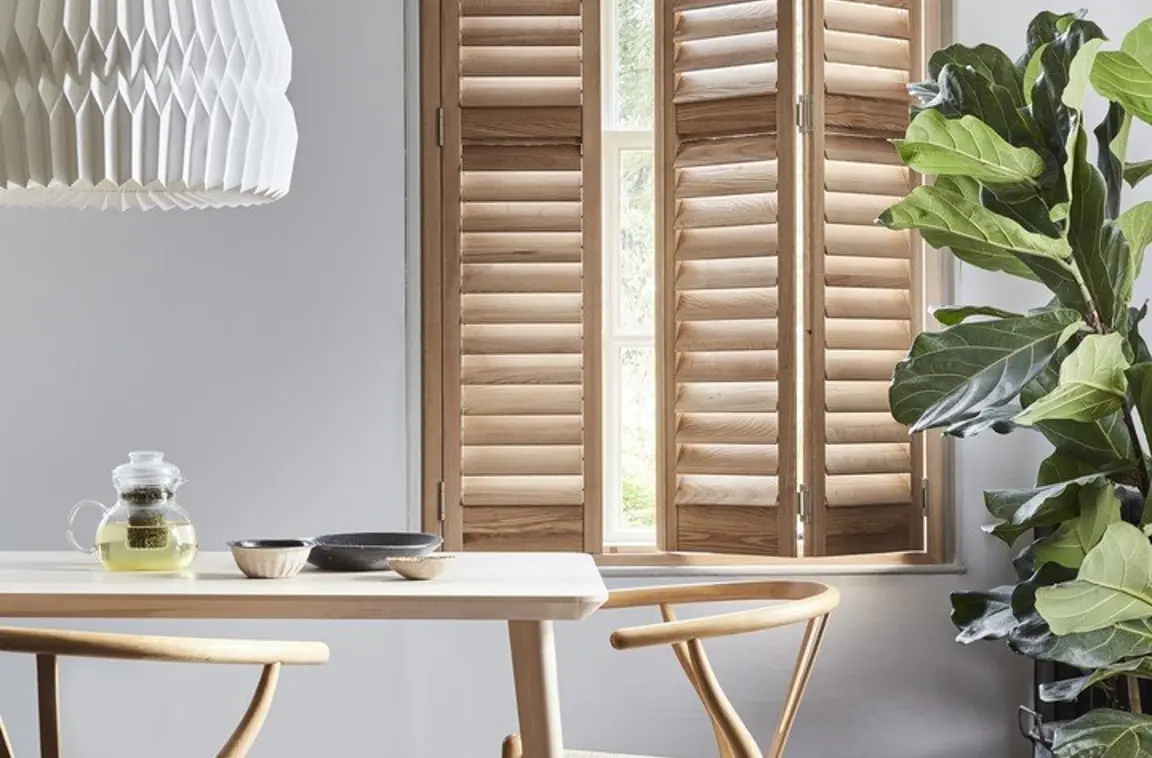 Honey Stained wooden interior shutters