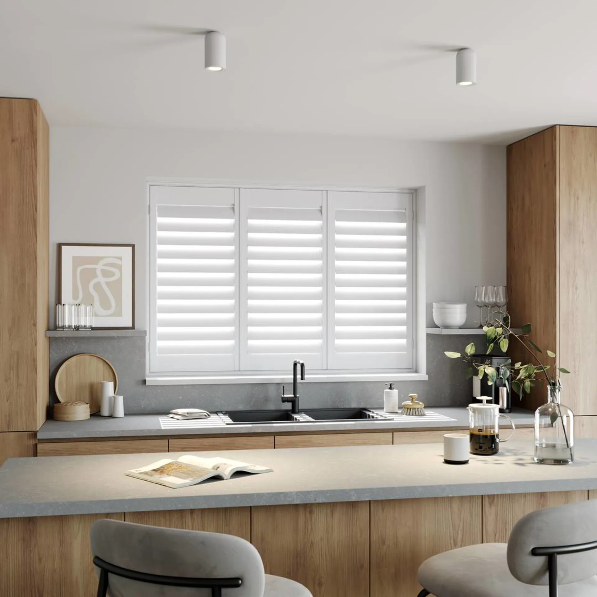 A modern kitchen with Vivid White full height wooden shutters
