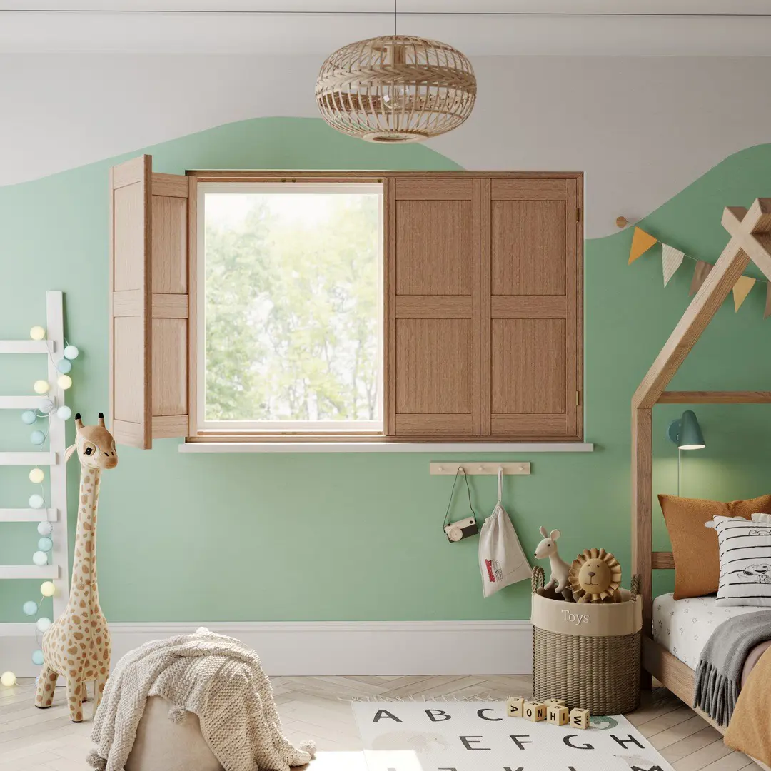 A children's bedroom with Honey Stained solid raised wooden shutters 