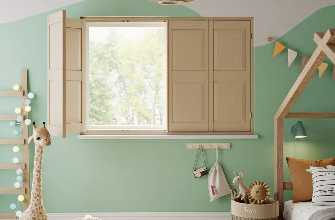 A children's bedroom with Natural Stained solid raised wooden shutters 