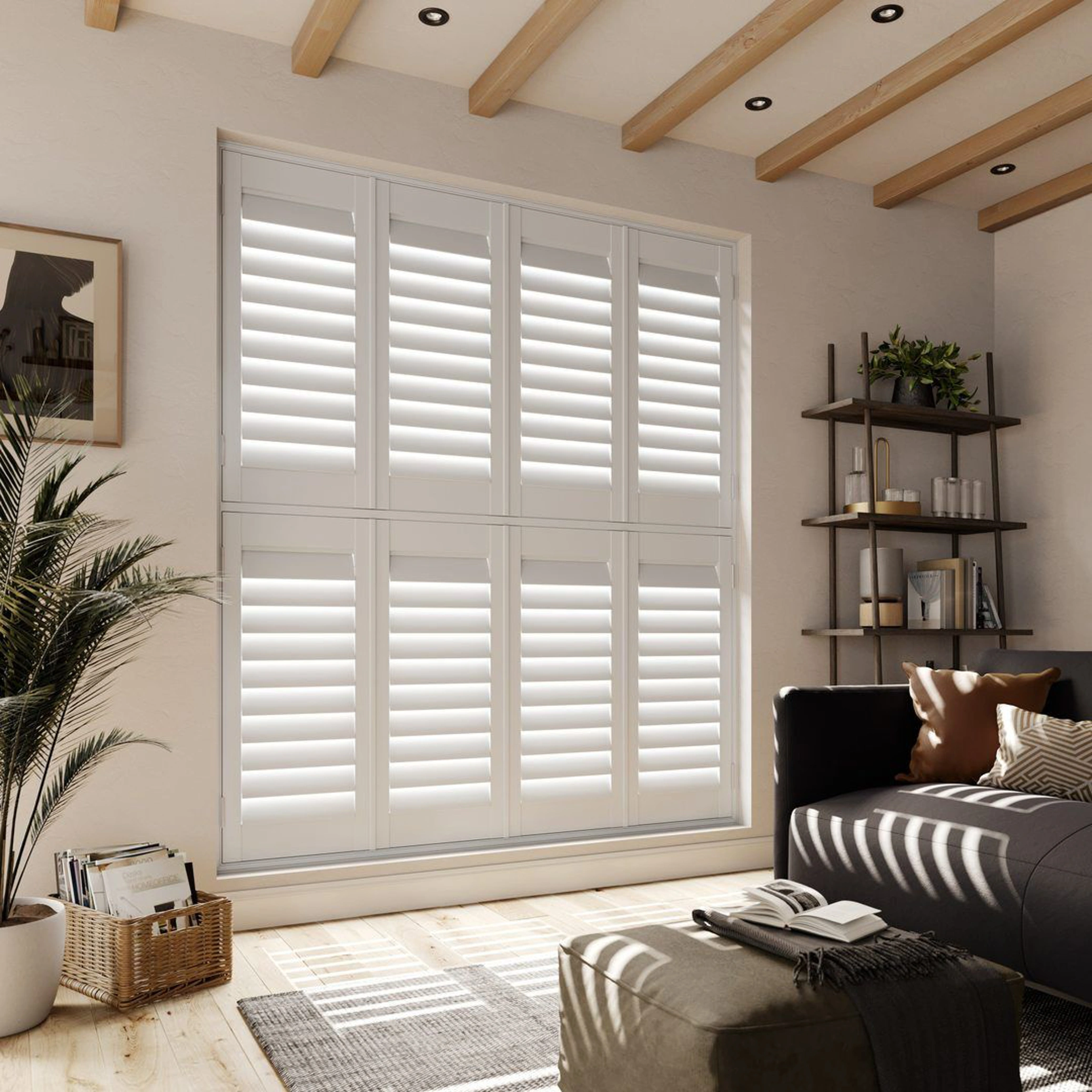 A neutral living room with Snow White tier on tier faux wood shutters 